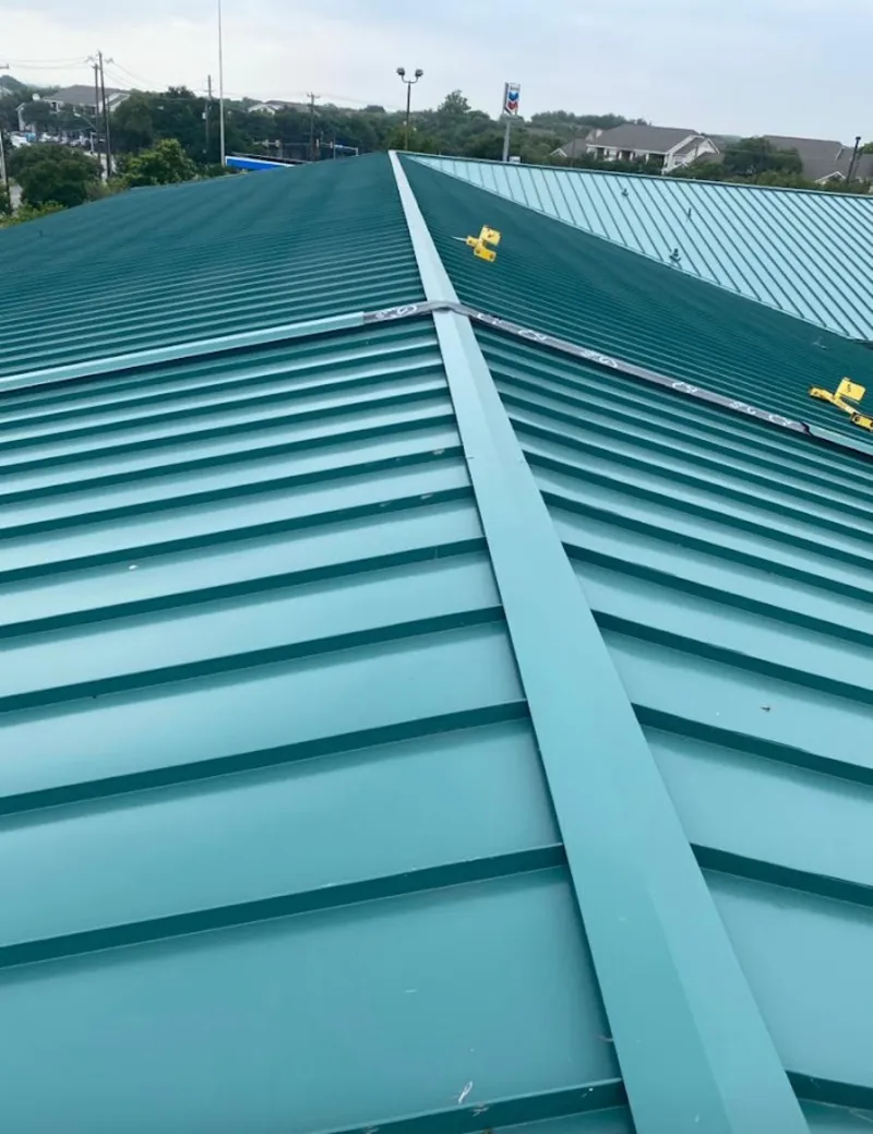 Green commercial metal roof ridge and valley for Metal Roof Repair in Buena Park